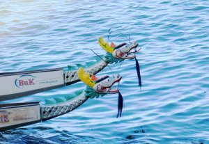 dragon_boat_heads_on_the_water_by_ohioeriecanalgirl-d5fjhc5.jpg